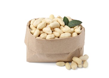 Photo of Peeled peanuts in paper bag isolated on white