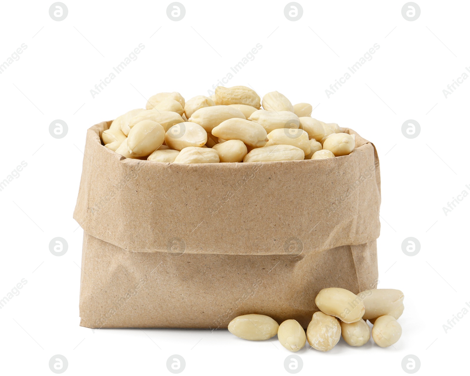 Peeled peanuts in paper bag isolated on white Photo of Peeled peanuts in paper bag isolated on white