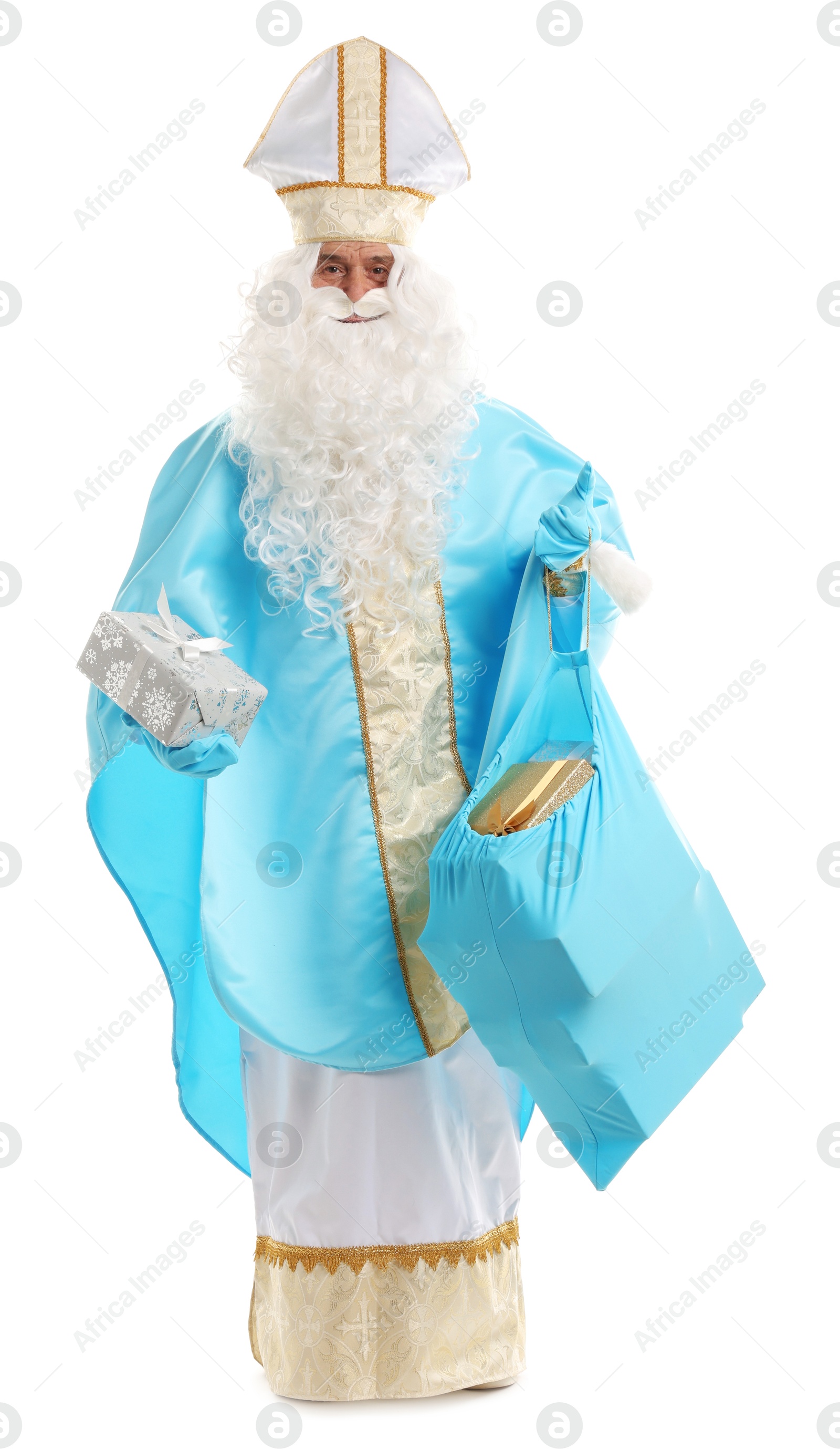 Photo of Saint Nicholas with bag of Christmas gifts on white background