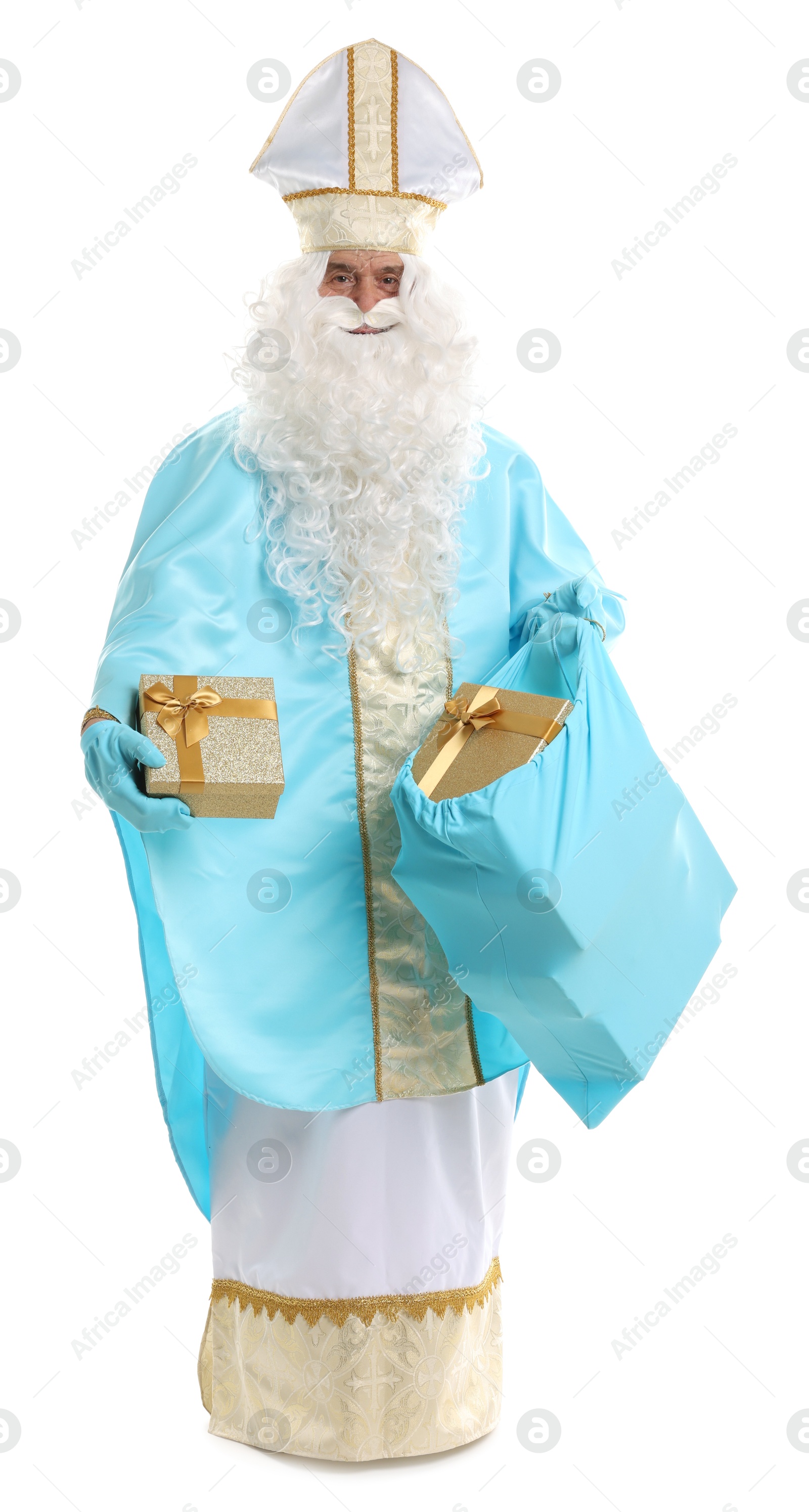 Photo of Saint Nicholas with bag of Christmas gifts on white background