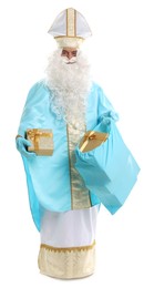 Saint Nicholas with bag of Christmas gifts on white background