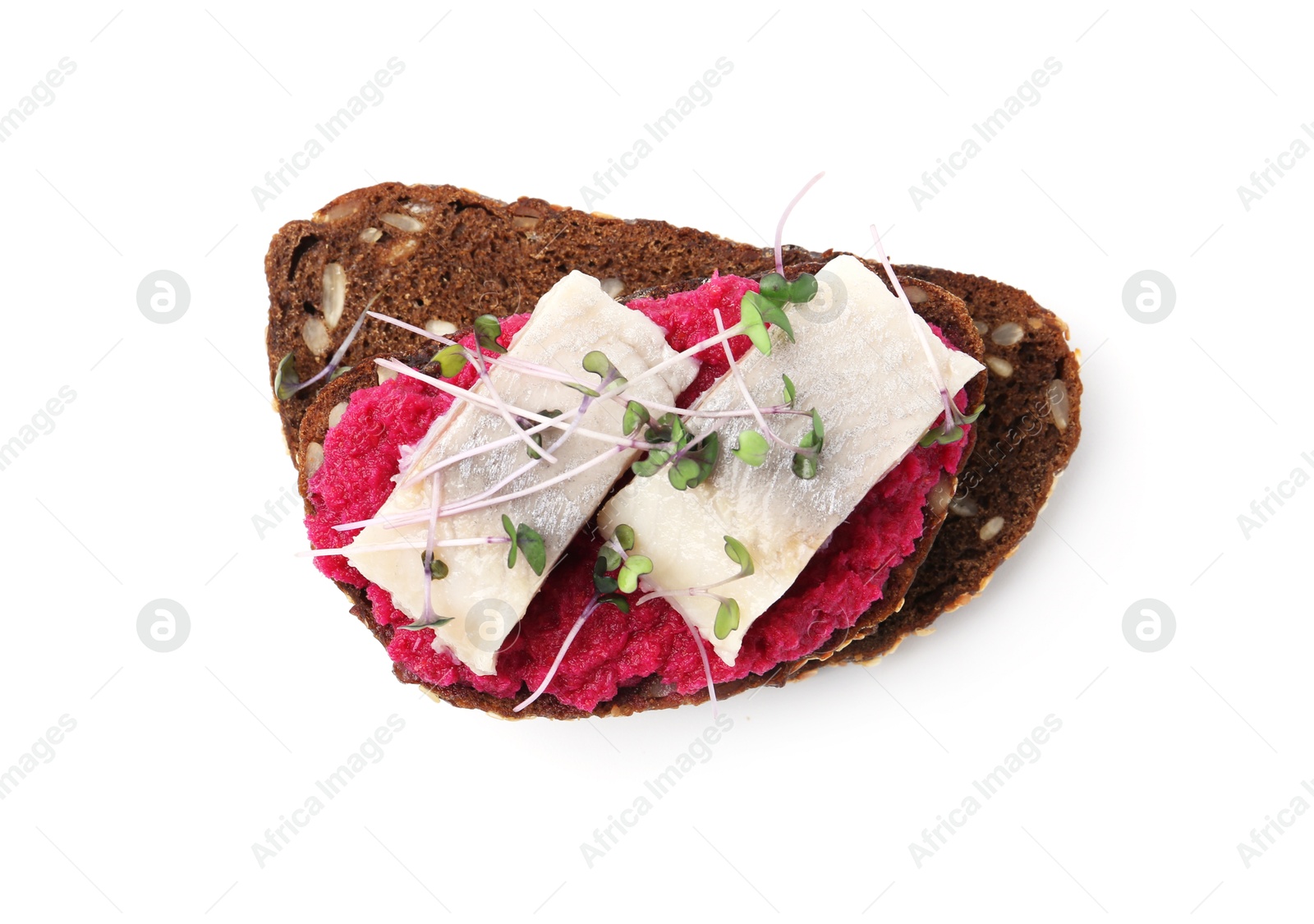 Photo of Tasty sandwich with herring and horseradish sauce on white background, top view