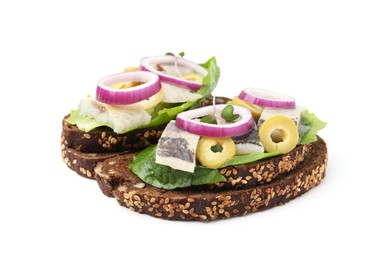 Tasty sandwiches with herring, onions, lettuce and olives isolated on white