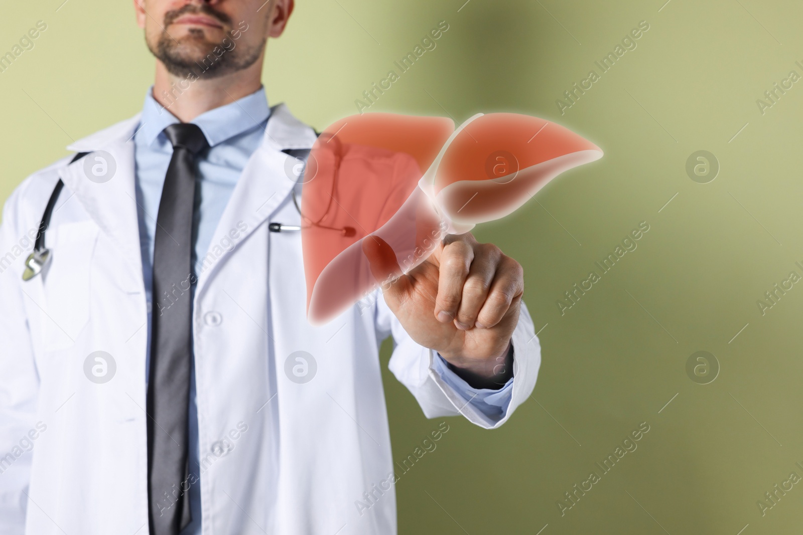 Image of Doctor with stethoscope pointing at illustration of liver on olive color background, closeup