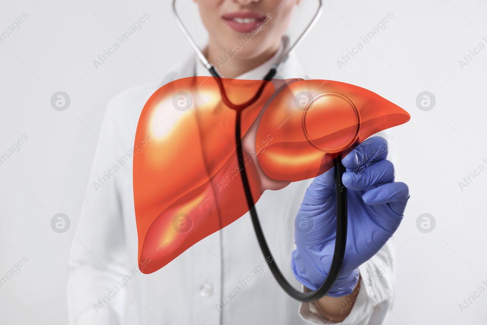 Image of Doctor with stethoscope and illustration of liver on white background, closeup