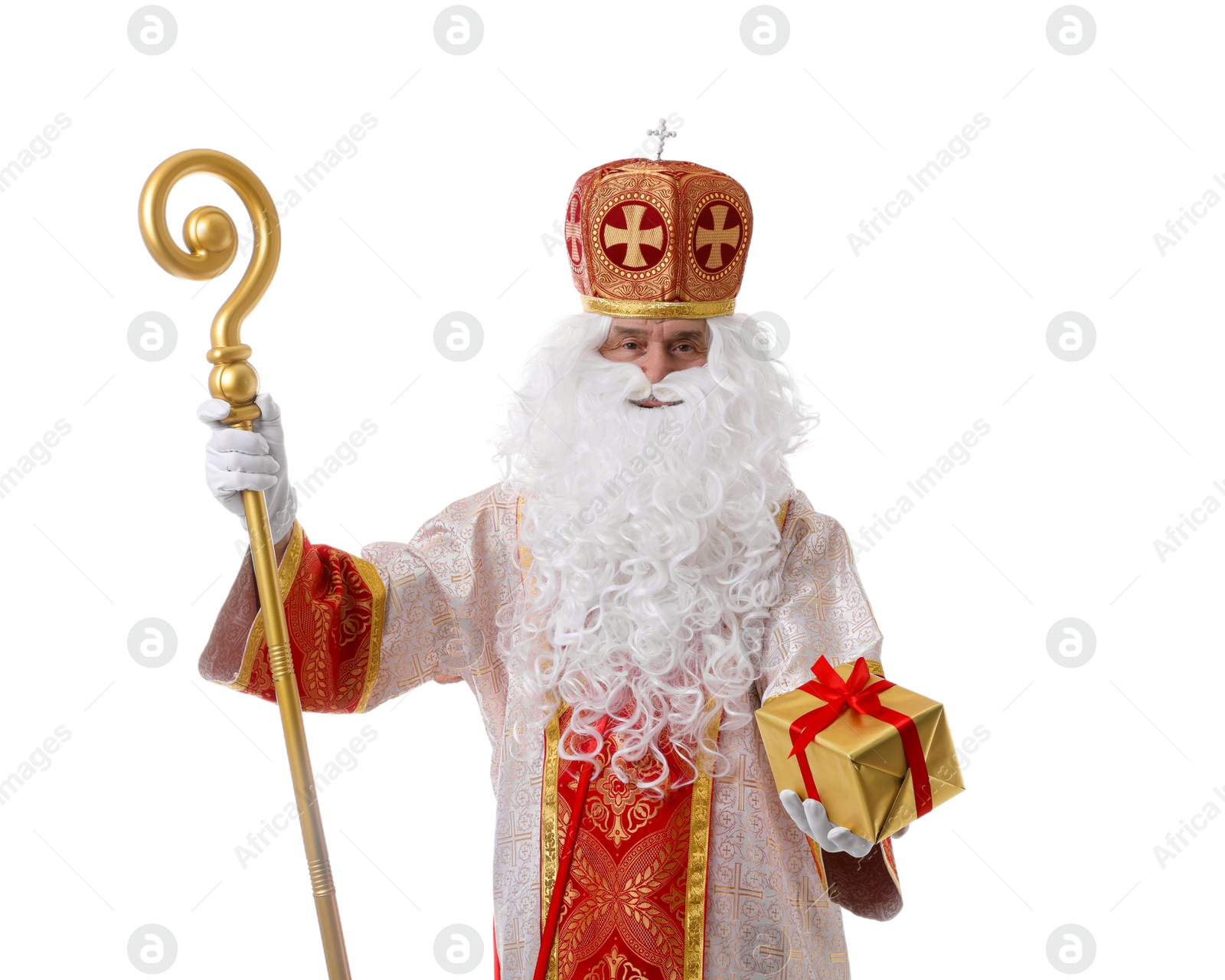 Photo of Saint Nicholas with gift on white background