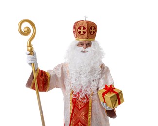 Photo of Saint Nicholas with gift on white background