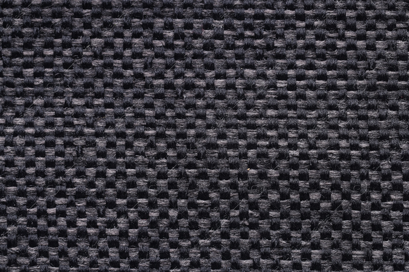 Photo of Texture of rough fabric as background, top view