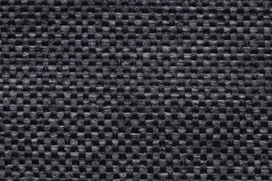 Photo of Texture of rough fabric as background, top view