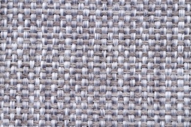 Photo of Texture of rough fabric as background, top view