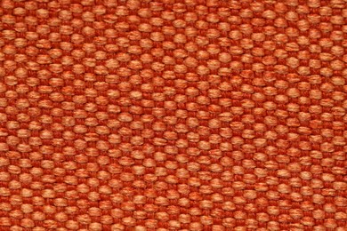 Photo of Texture of rough fabric as background, top view