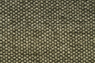 Photo of Texture of rough fabric as background, top view