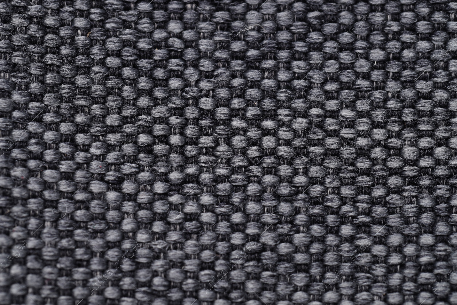 Photo of Texture of rough fabric as background, top view