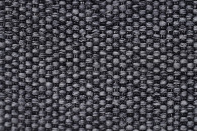 Photo of Texture of rough fabric as background, top view