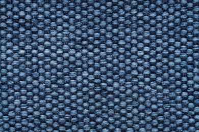 Photo of Texture of rough fabric as background, top view