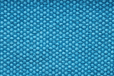 Photo of Texture of rough fabric as background, top view