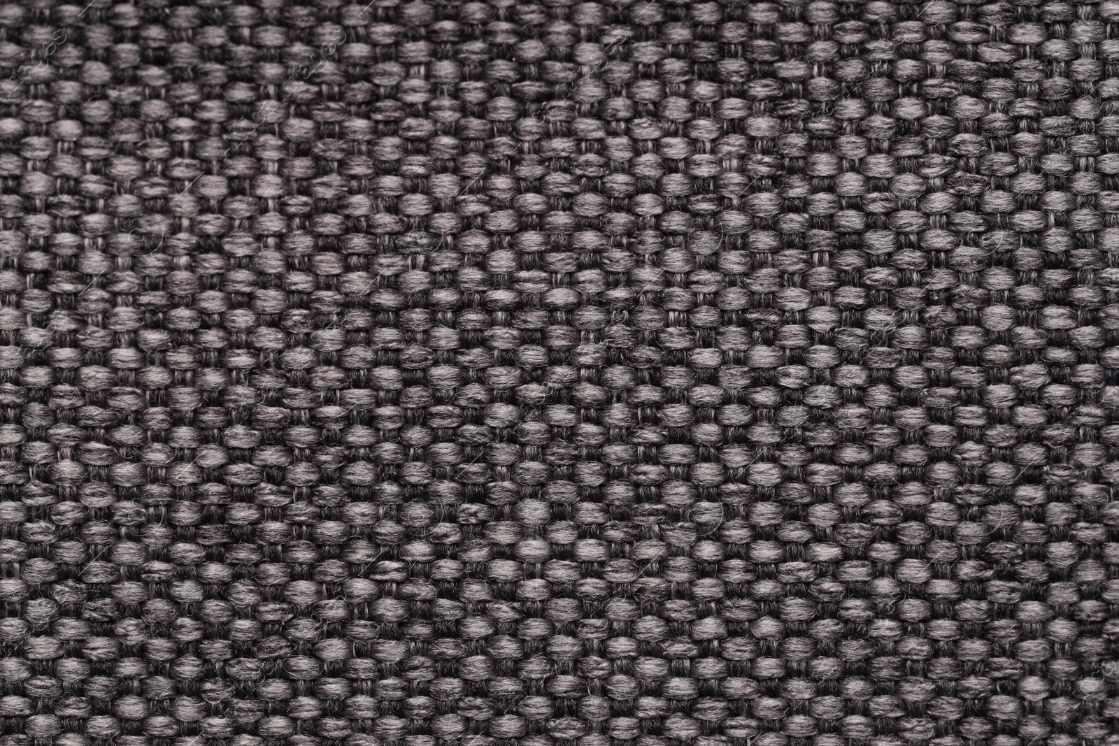 Photo of Texture of rough fabric as background, top view