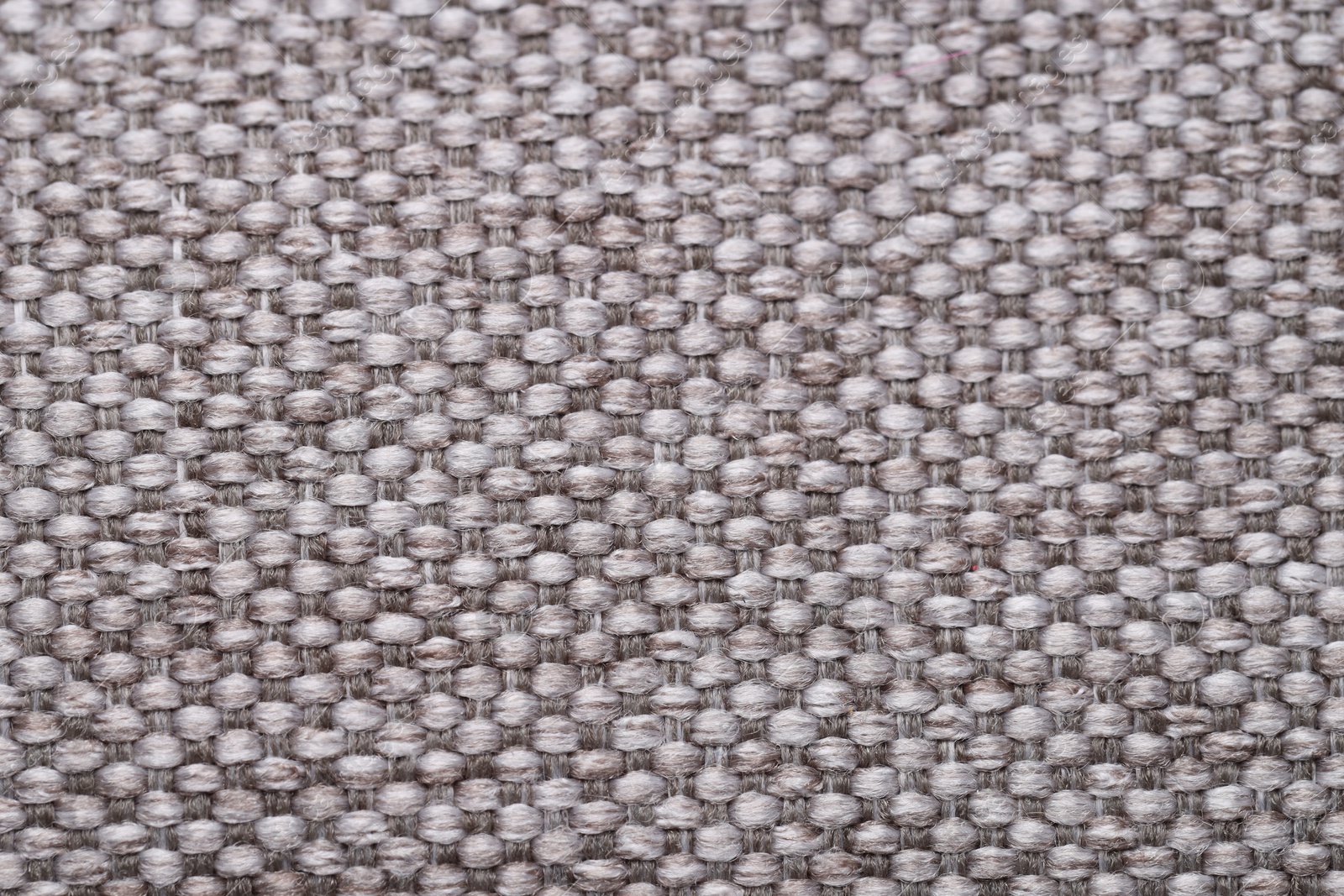 Photo of Texture of rough fabric as background, top view