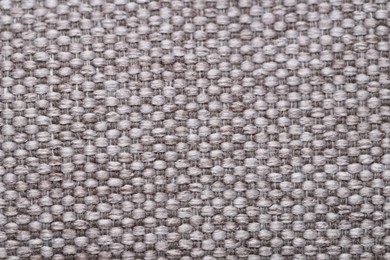 Photo of Texture of rough fabric as background, top view