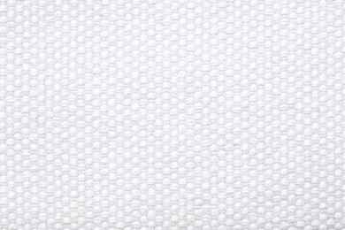 Photo of Texture of rough fabric as background, top view