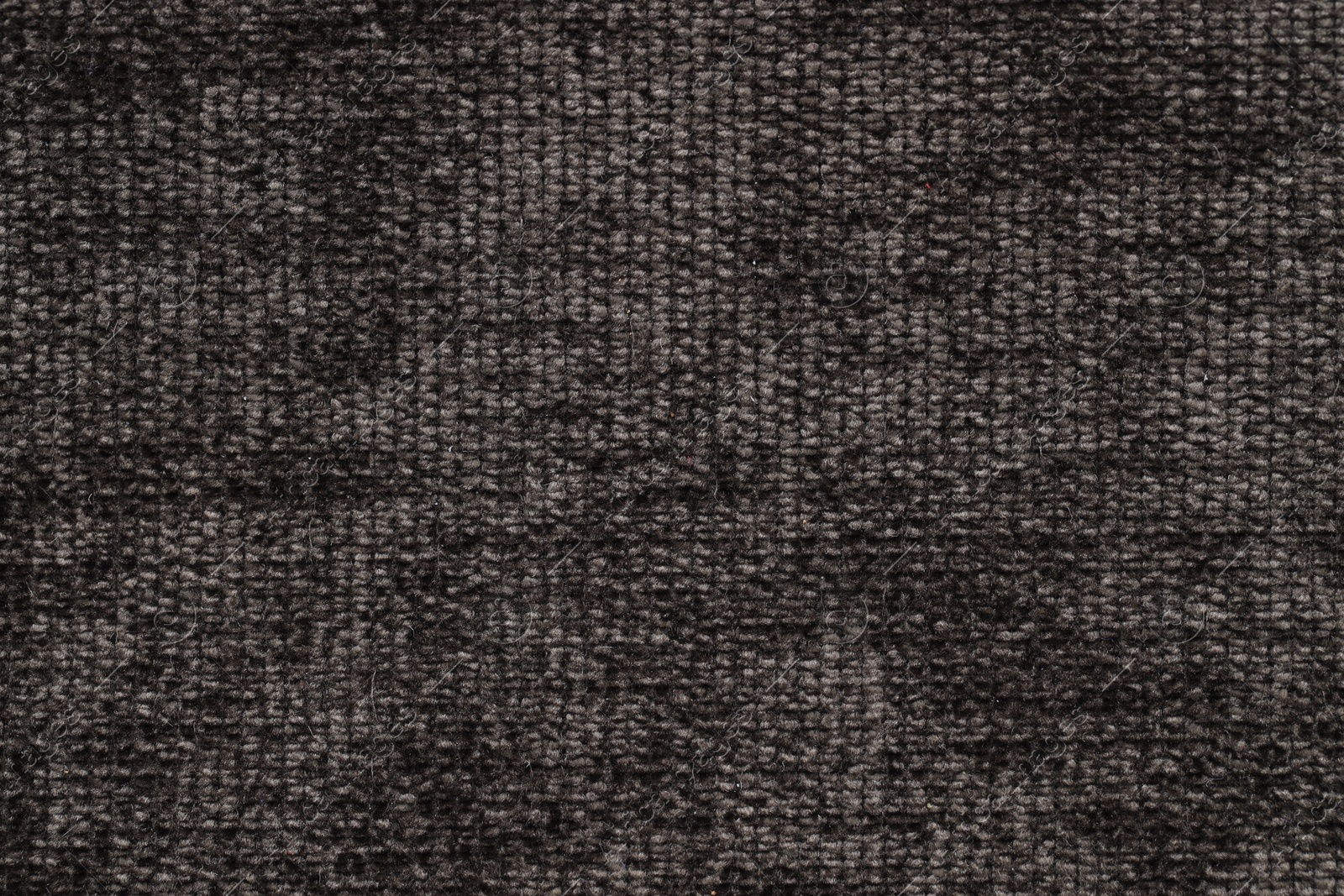 Photo of Texture of black woven fabric as background, top view