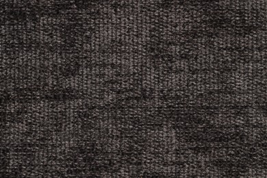 Photo of Texture of black woven fabric as background, top view