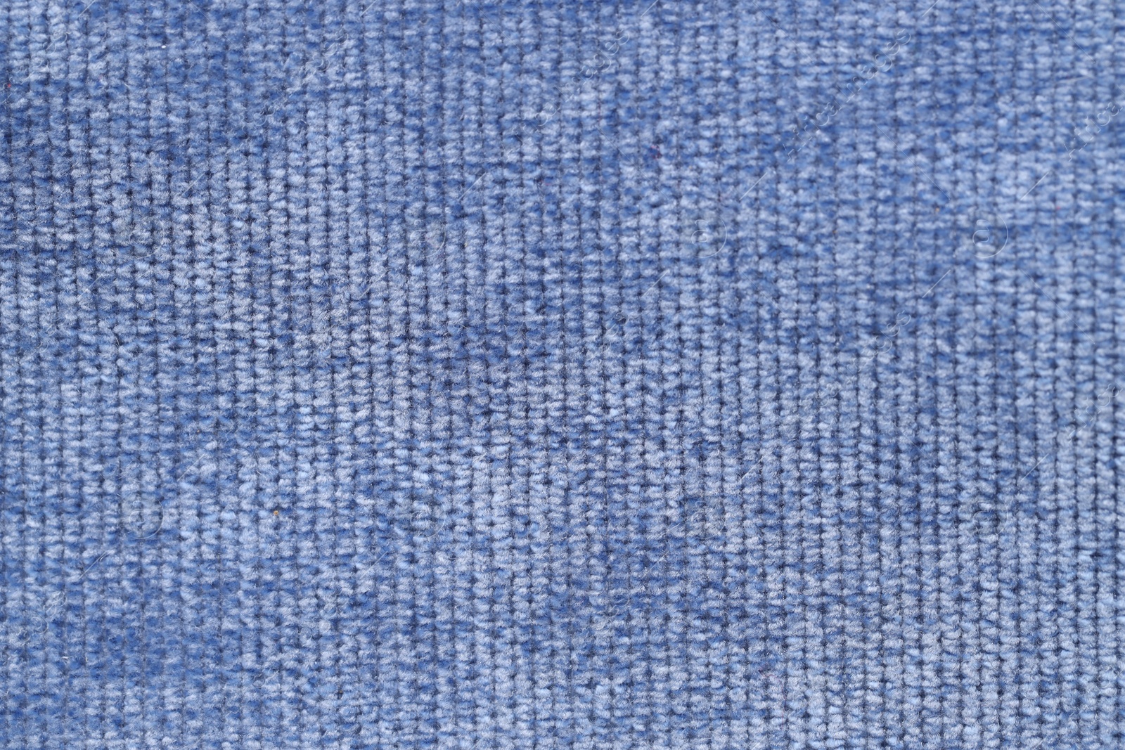 Photo of Texture of blue woven fabric as background, top view