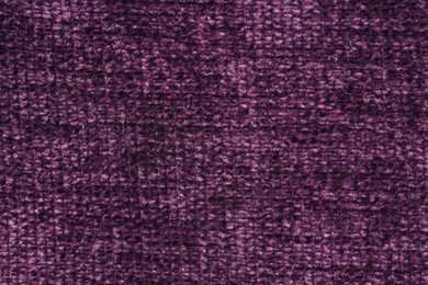 Photo of Texture of purple woven fabric as background, top view