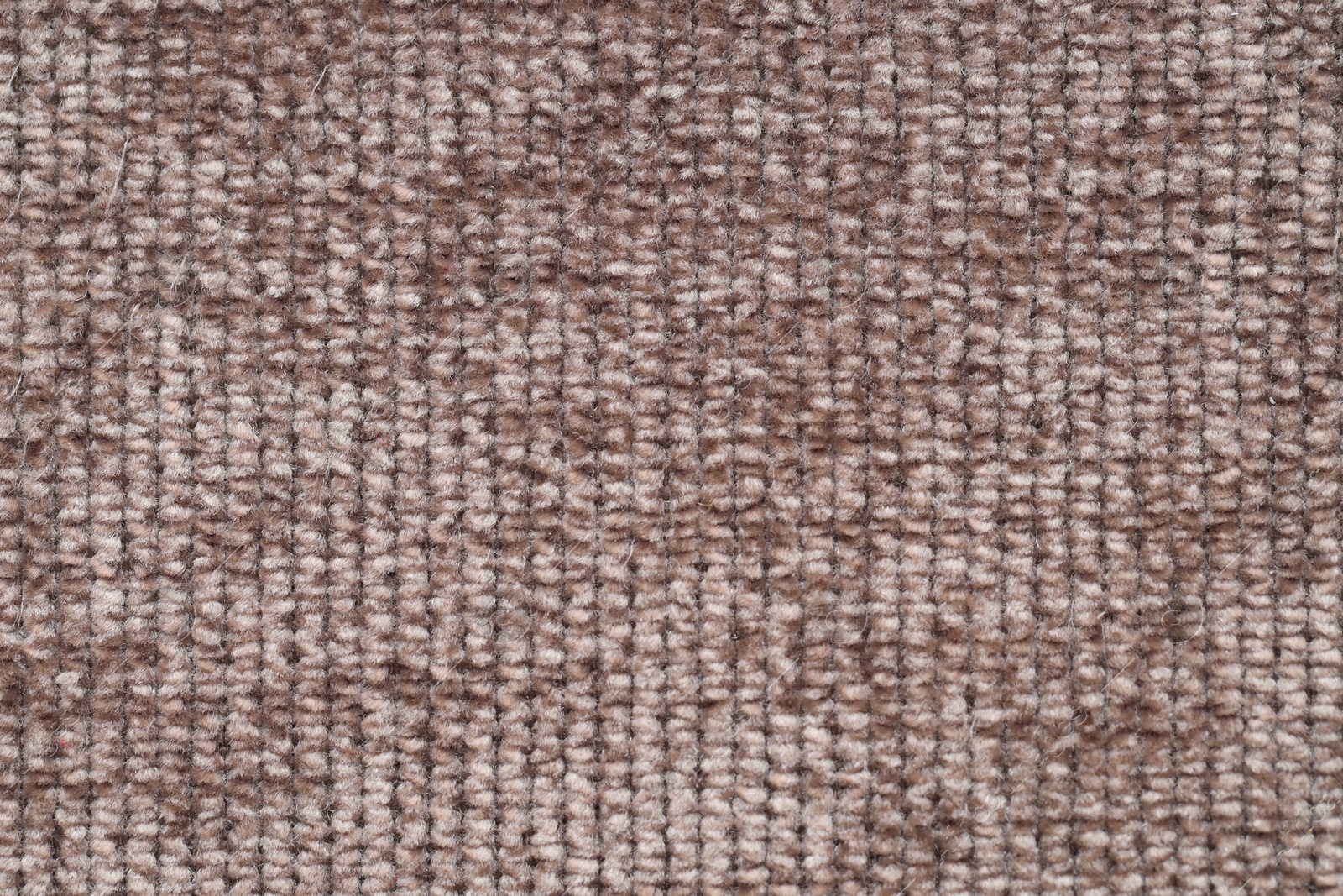 Photo of Texture of brown woven fabric as background, top view