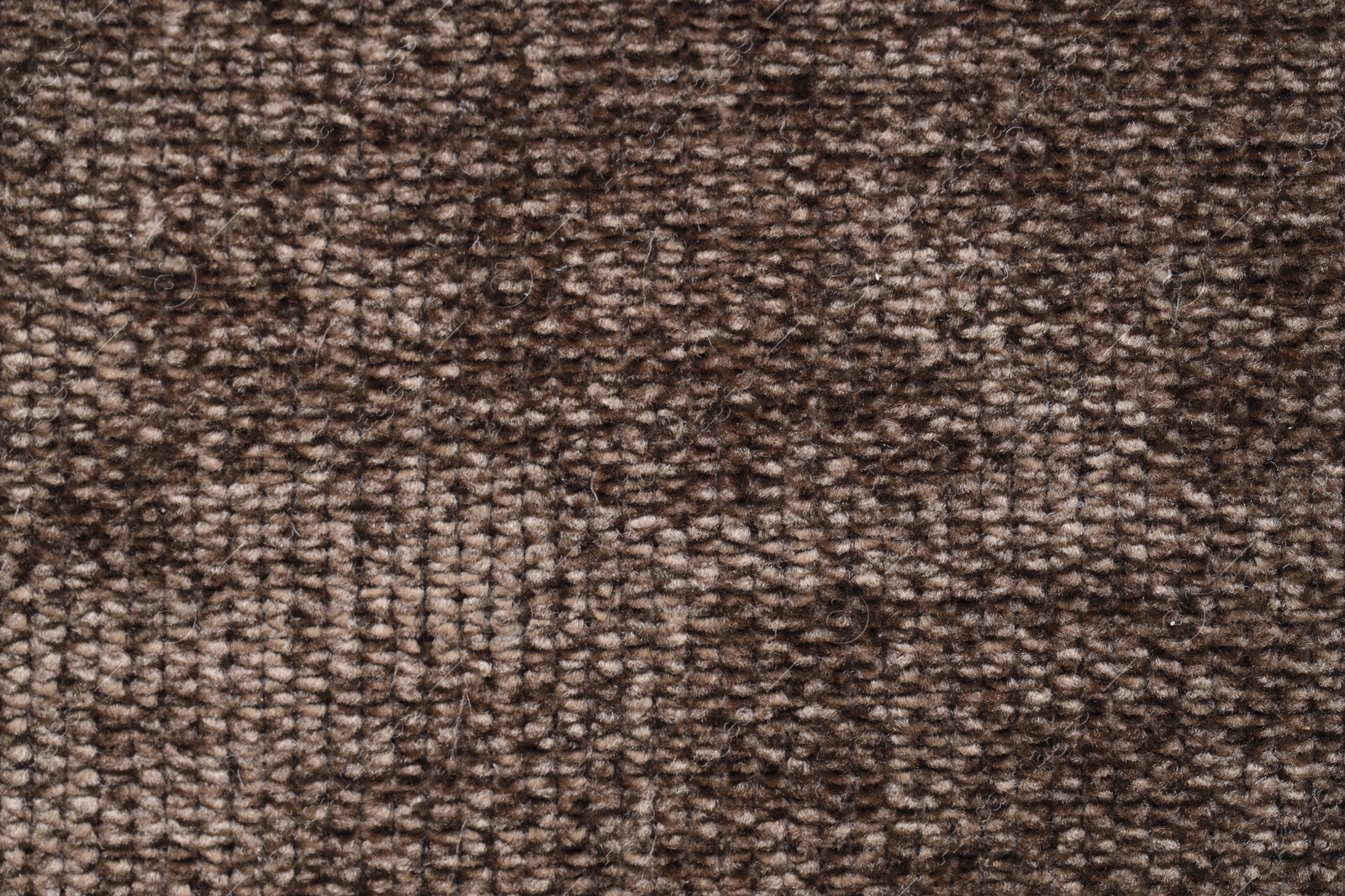 Photo of Texture of brown woven fabric as background, top view