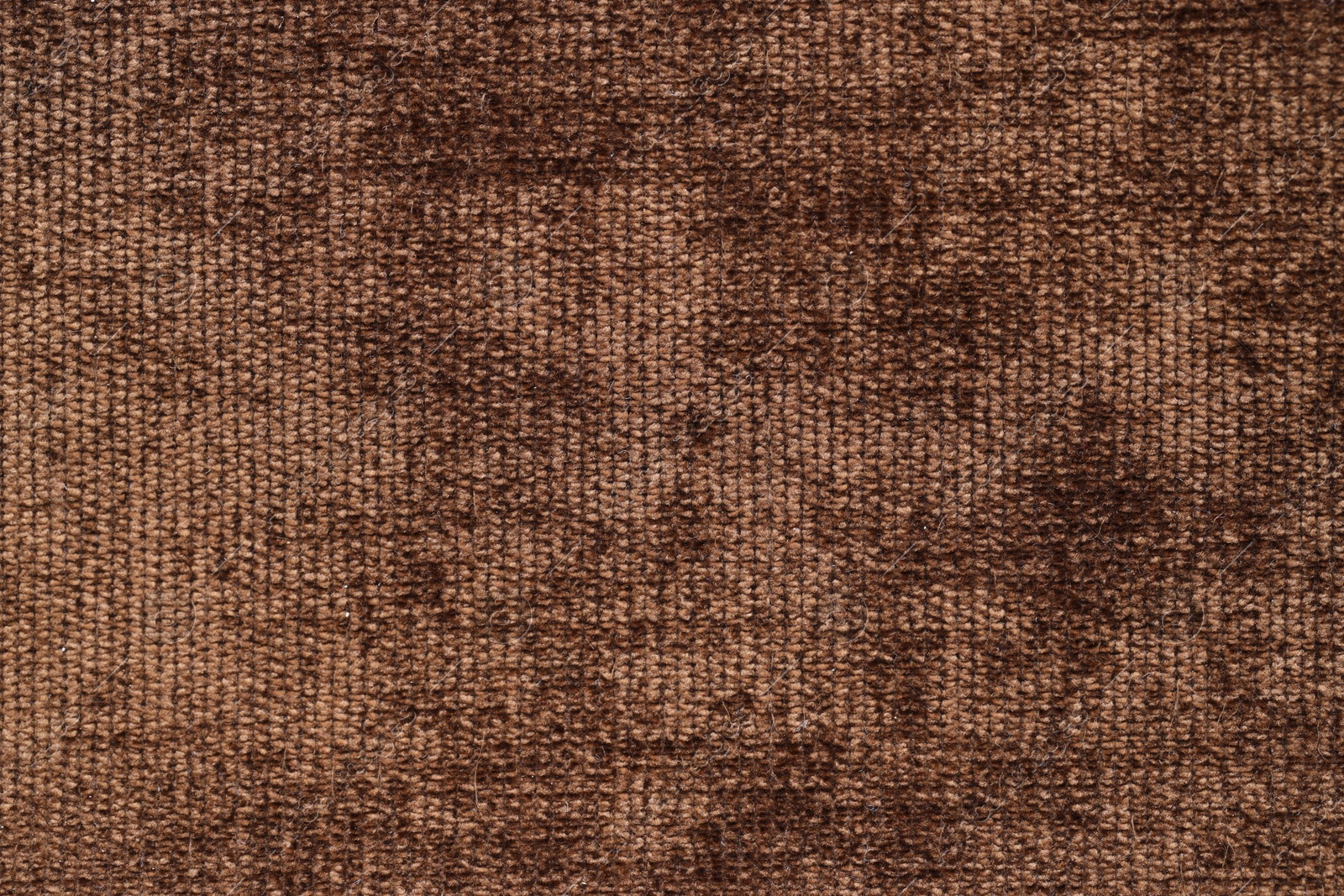 Photo of Texture of brown woven fabric as background, top view