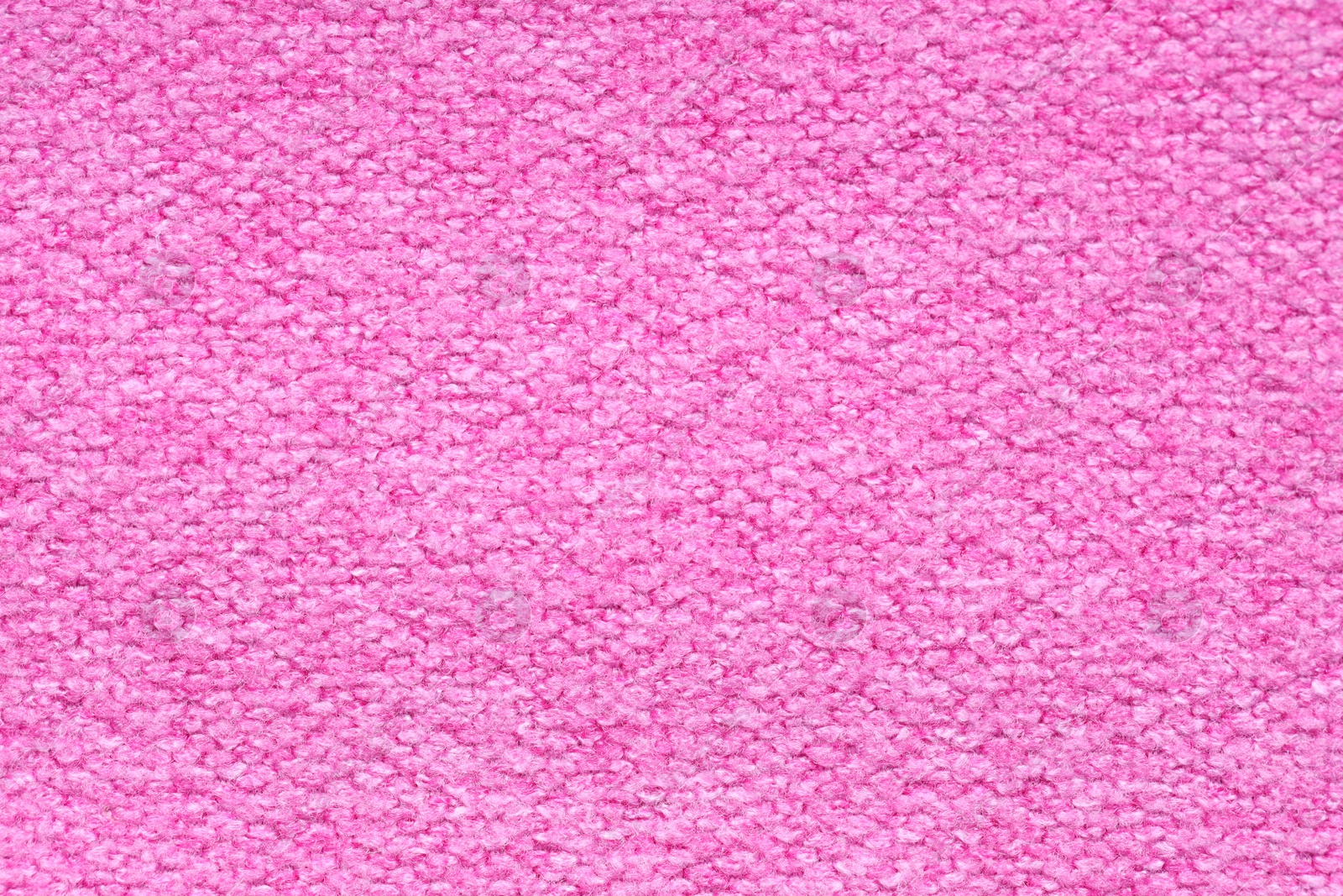 Photo of Texture of pink woven fabric as background, top view