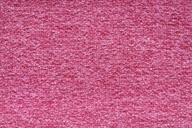 Photo of Texture of pink woven fabric as background, top view