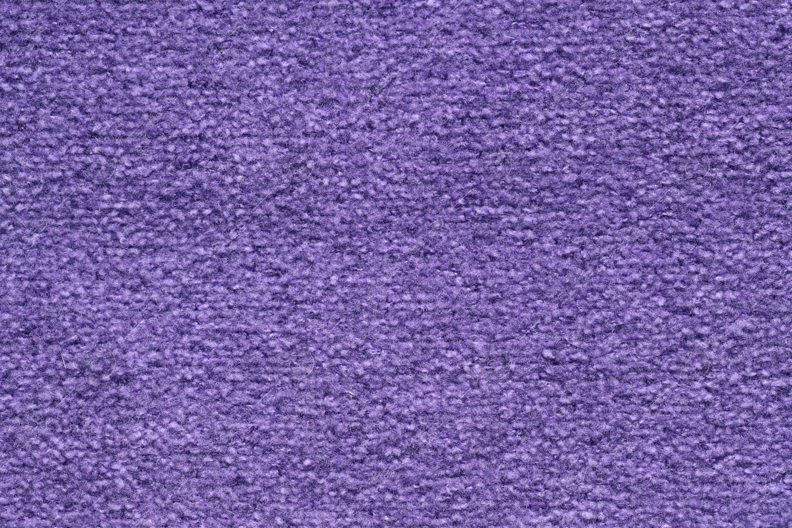 Photo of Texture of purple woven fabric as background, top view