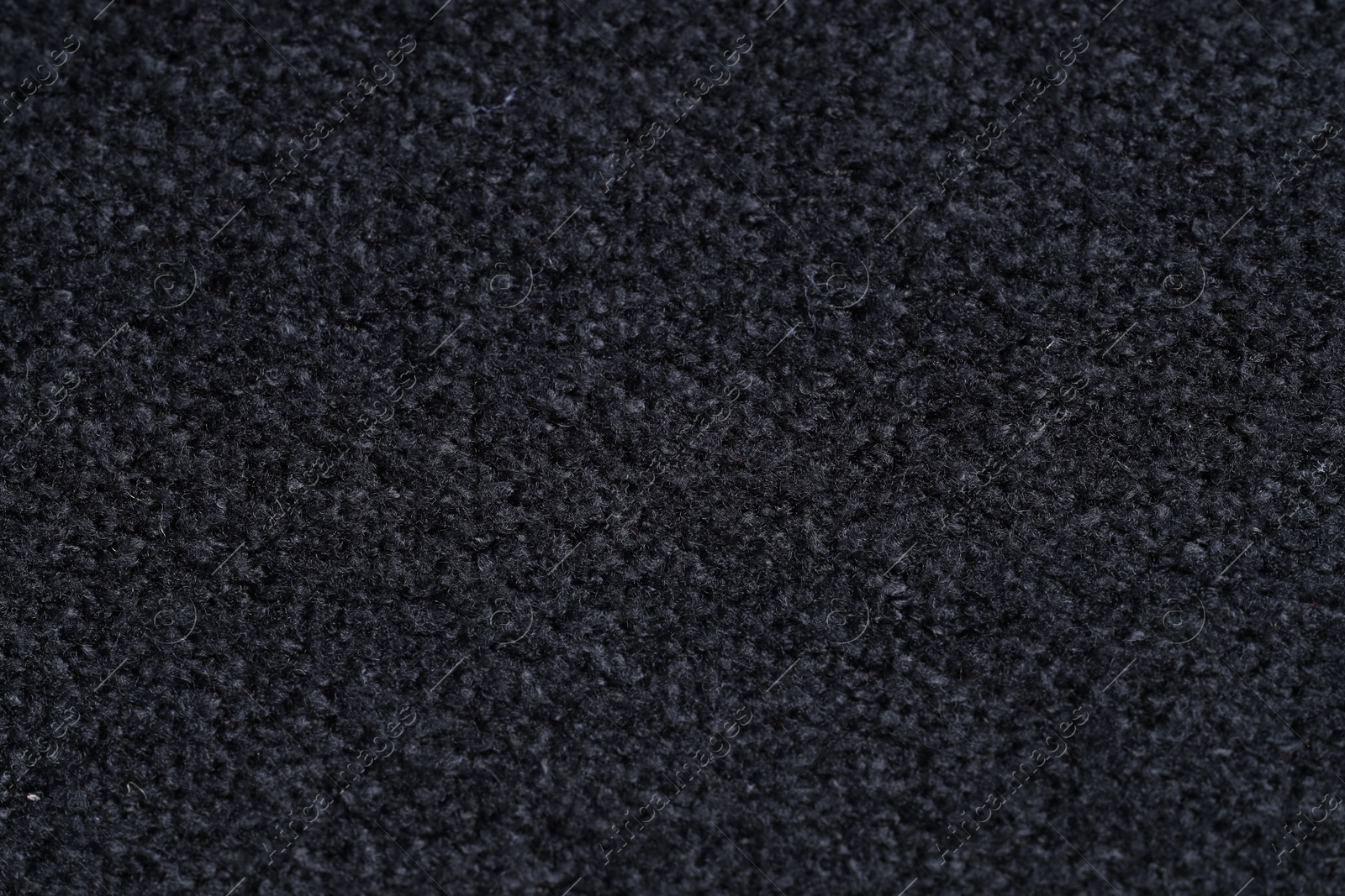 Photo of Texture of black woven fabric as background, top view