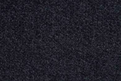 Photo of Texture of black woven fabric as background, top view