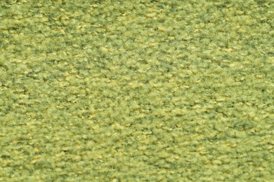 Photo of Texture of green woven fabric as background, top view