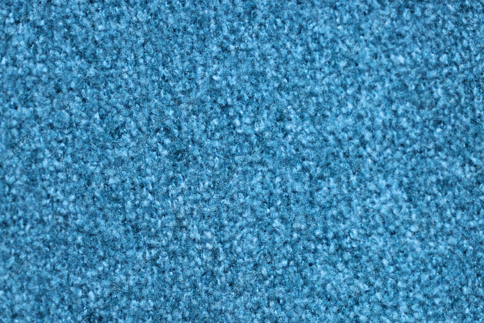 Photo of Texture of light blue woven fabric as background, closeup