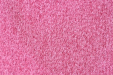 Photo of Texture of pink woven fabric as background, top view