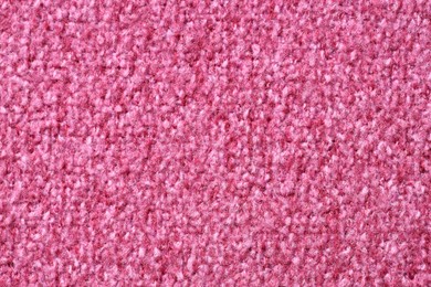 Photo of Texture of pink woven fabric as background, top view