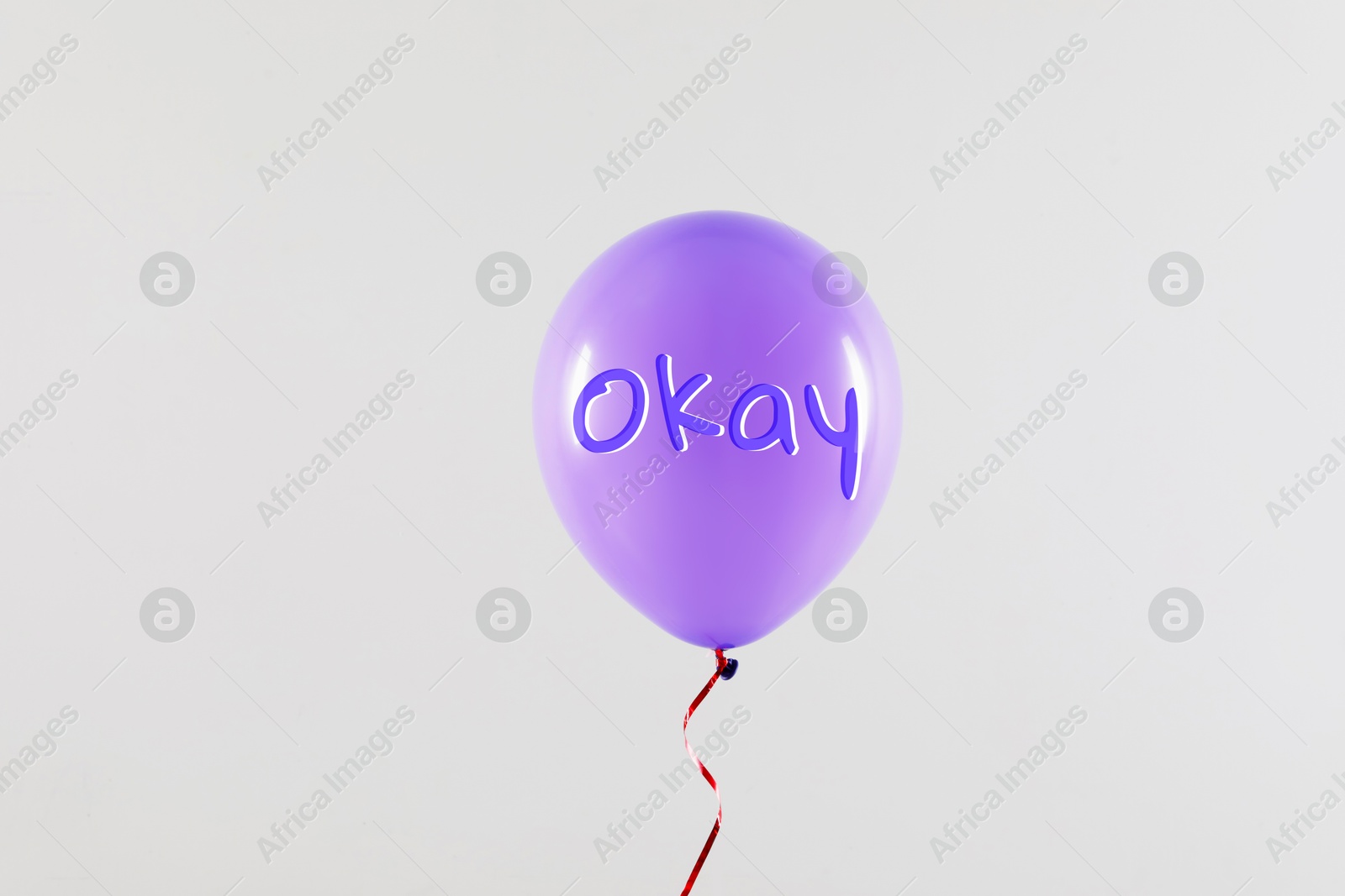 Image of Violet balloon with word Okay on light grey background