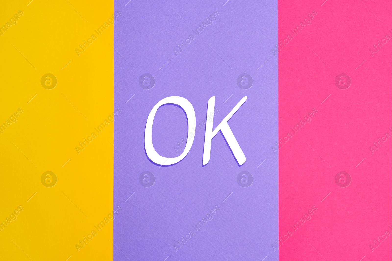 Image of Abbreviation OK on color background, top view