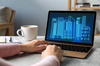 Building information modeling. Woman working at laptop indoors, closeup. Digital project on computer display