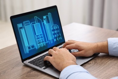 Image of Building information modeling. Man working at laptop indoors, closeup. Digital project on computer display