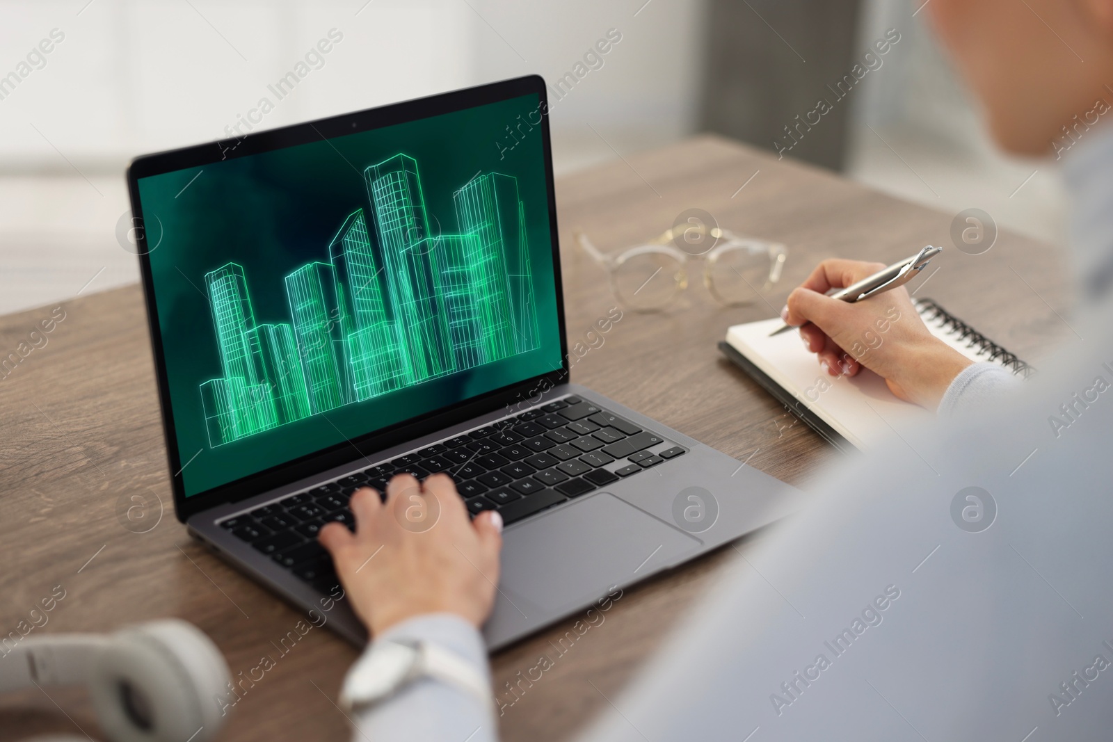 Image of Building information modeling. Woman working at laptop indoors, closeup. Digital project on computer display