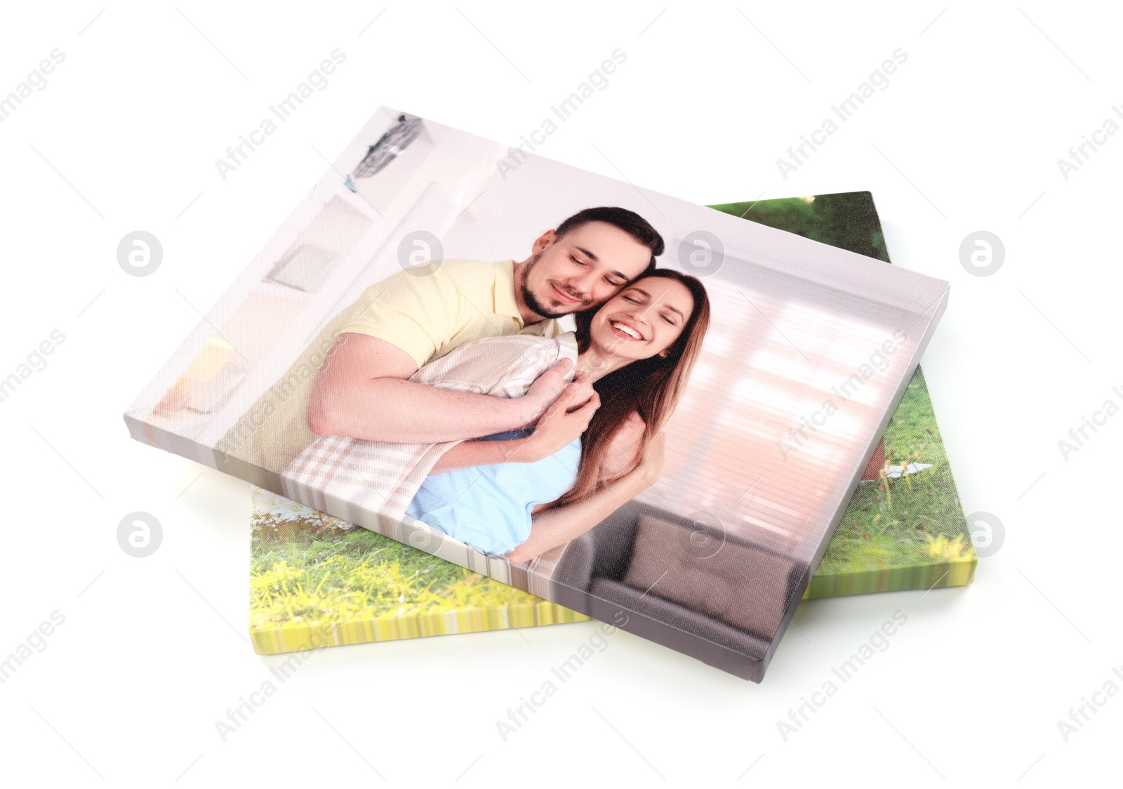 Photo of Canvas with different printed photos isolated on white