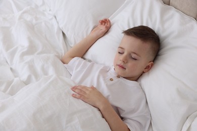 Bedtime. Cute boy sleeping in comfortable bed