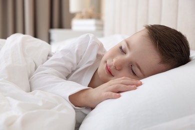 Bedtime. Cute boy sleeping in comfortable bed