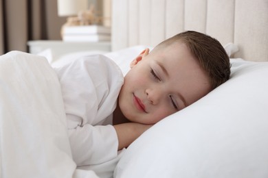 Bedtime. Cute boy sleeping in comfortable bed