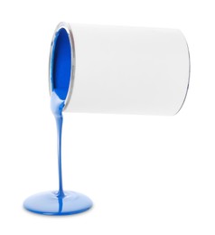 Photo of Blue paint flowing down from can on white background